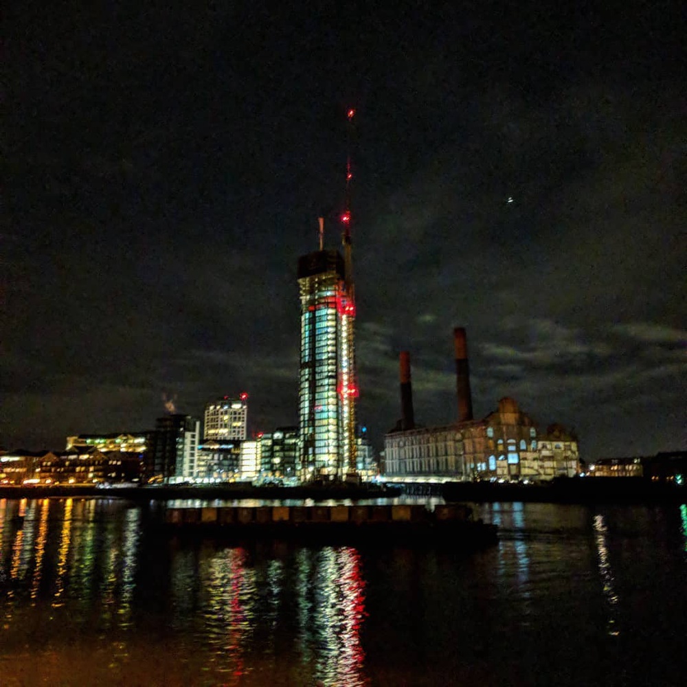 When I was about 7 years I got Lego set 6776, "Ogels Control Center". I think Chelsea Waterfront looks a bit like it at night. Think it must be the red lights