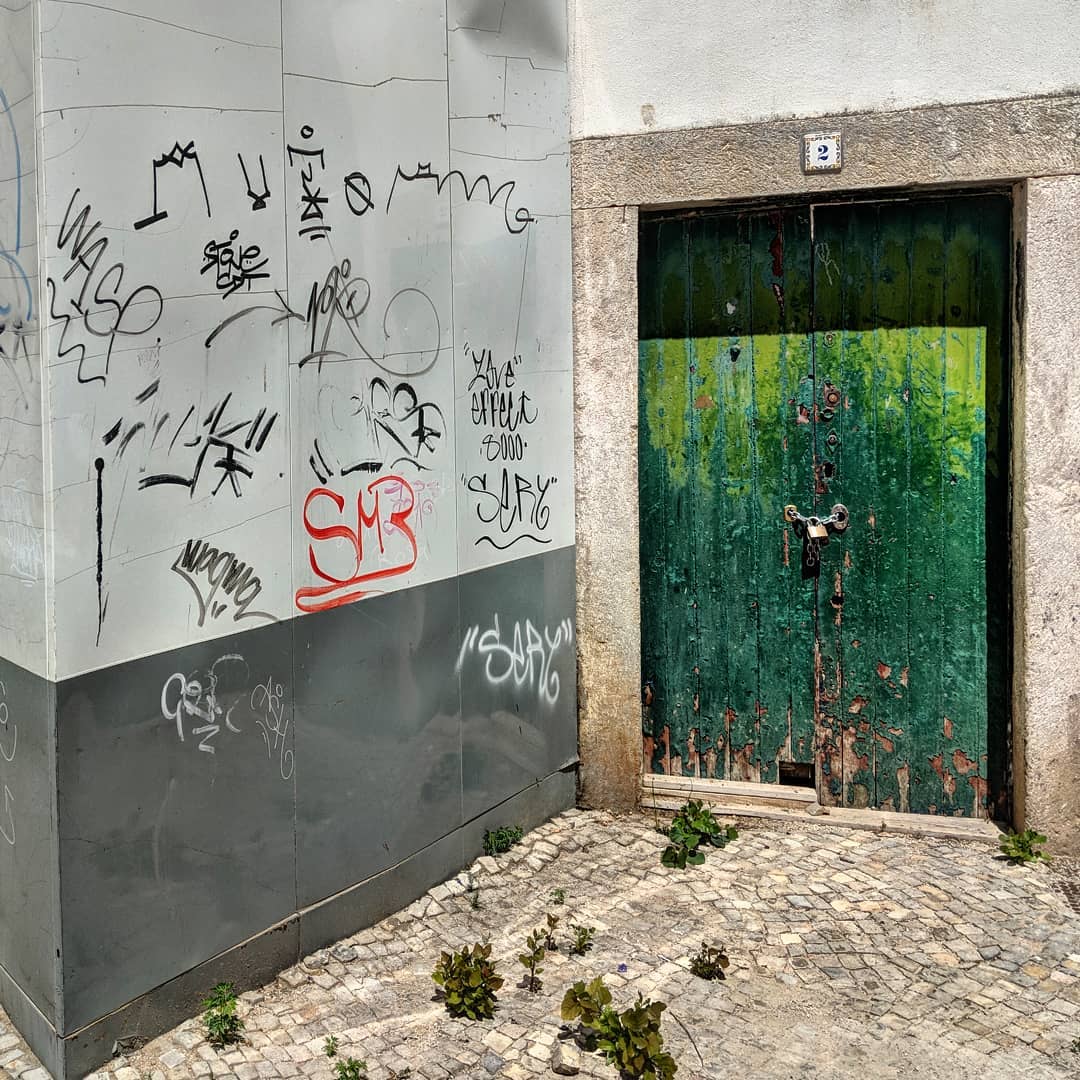 This is the green graffiti door. I don't know where it goes.