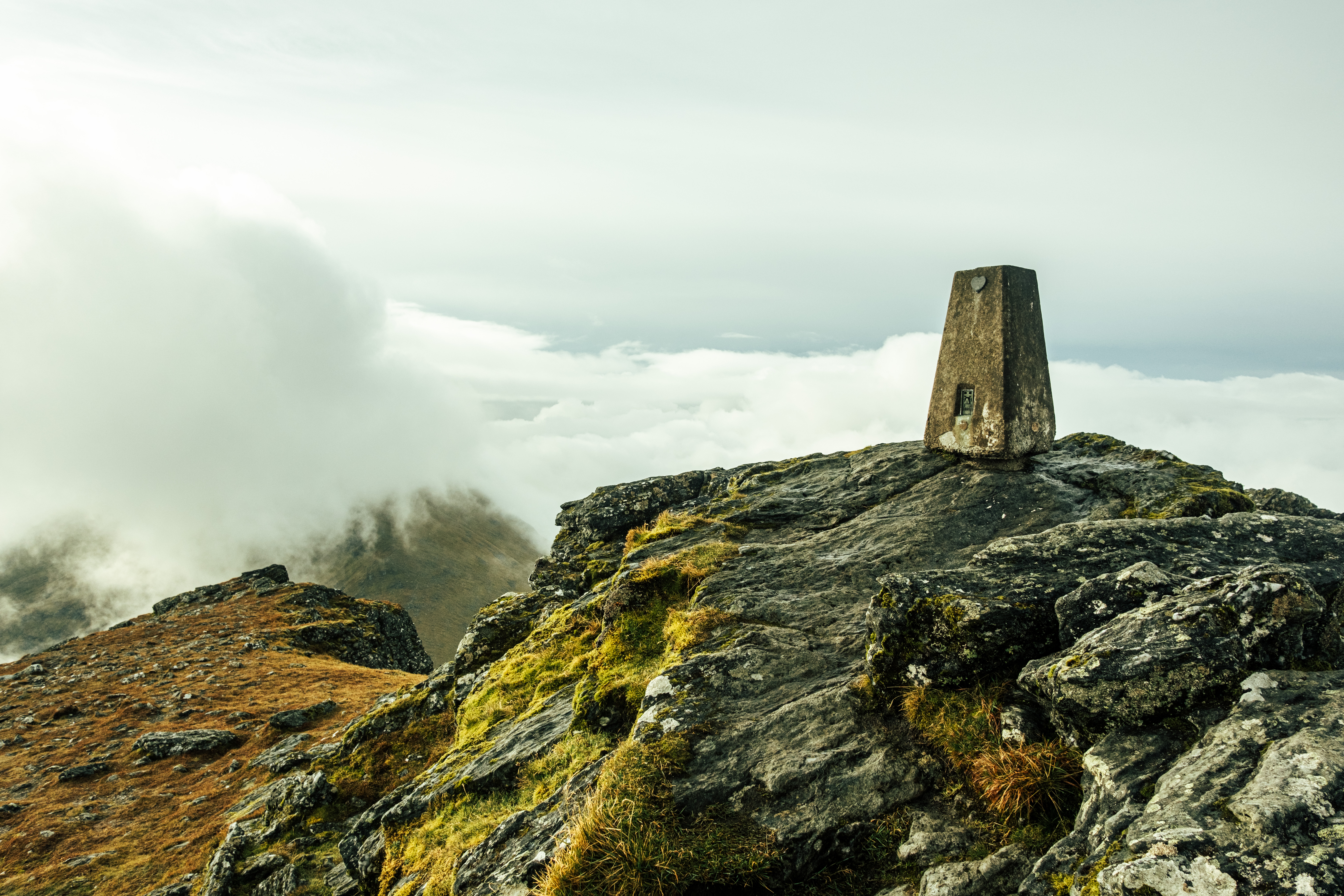 Trig point at the top of Ben More, getting _more_ sunny. 