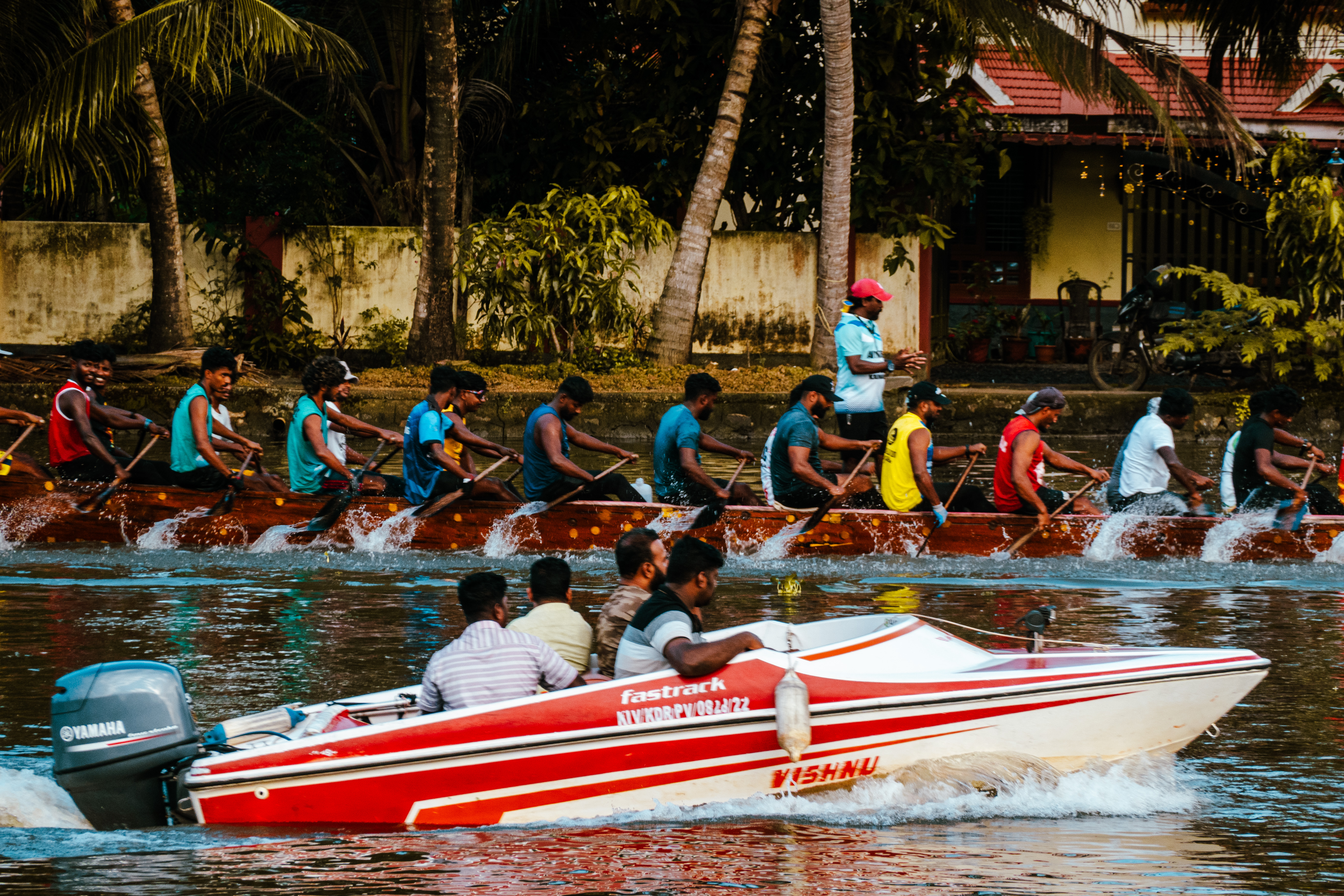 This is the Champakkulam "Chundan vallam" ("beaked boat") team practicing before a Kerala snake boat competion at the weekend.