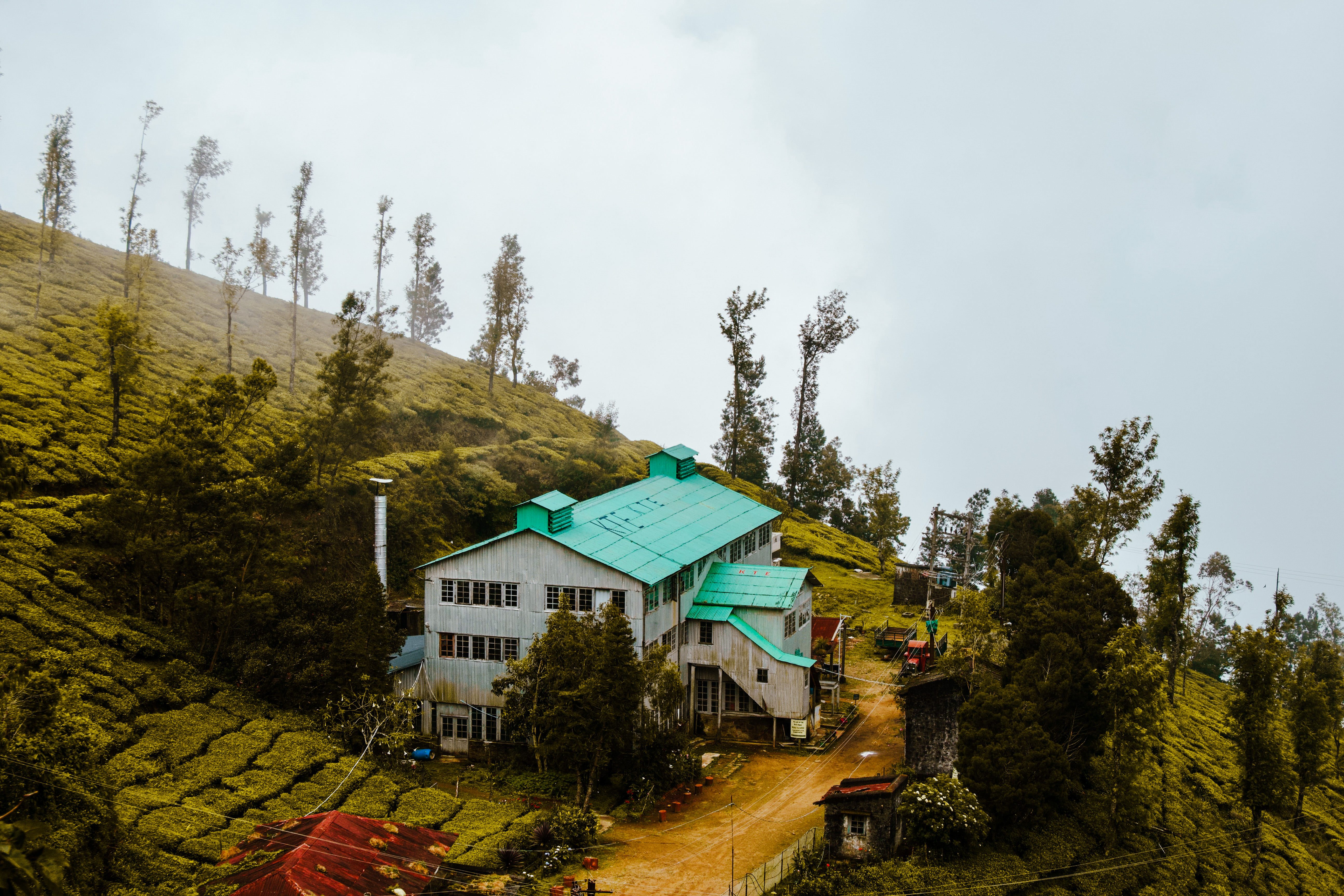 The Kolukkumalai Tea Factory. This is taken from the same location as a black and white image from the factory's opening in 1936 but I've not got a link, you'll just have to go visit.