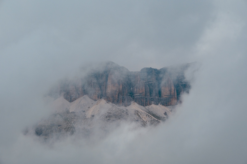 Looking up to Sass de Forcia Occidentale. Thunderstorm forecast.