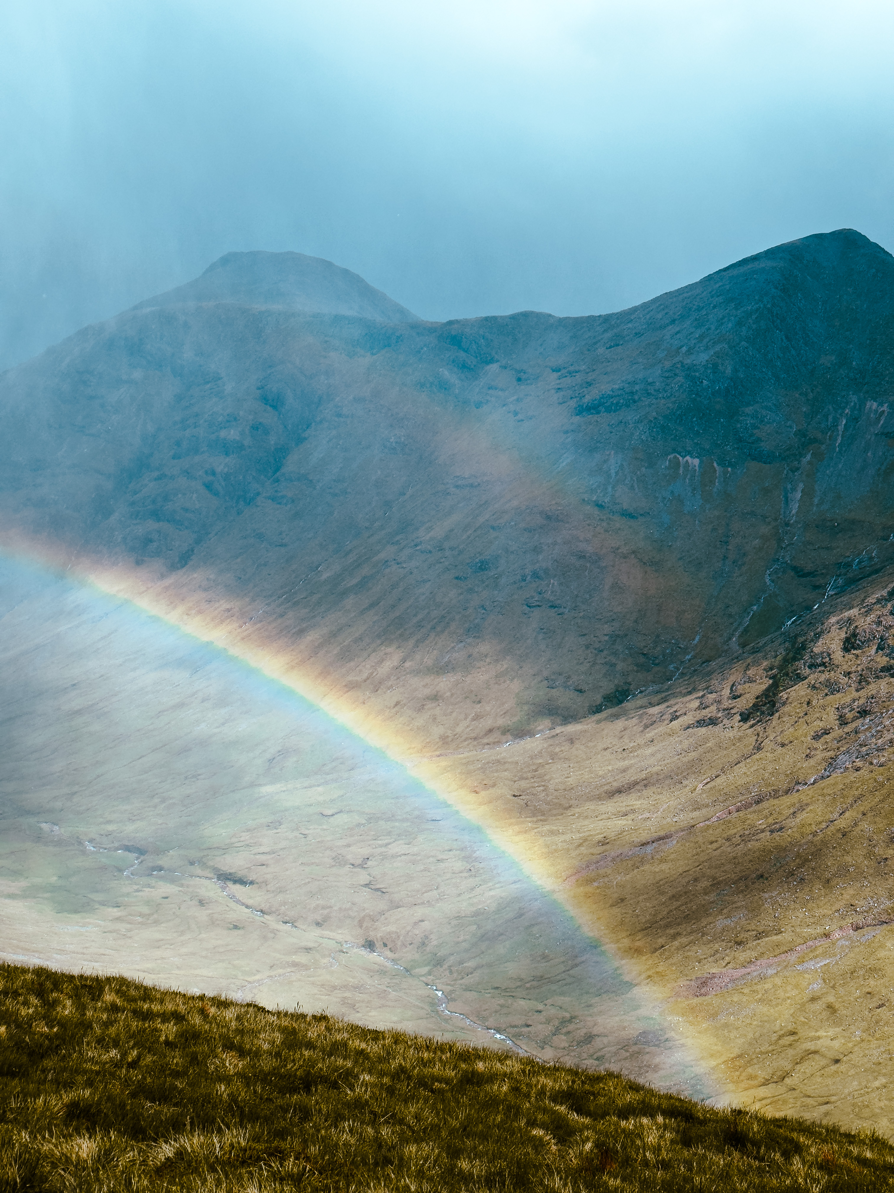 Double rainbow between heavy rain on Stob Dubh.