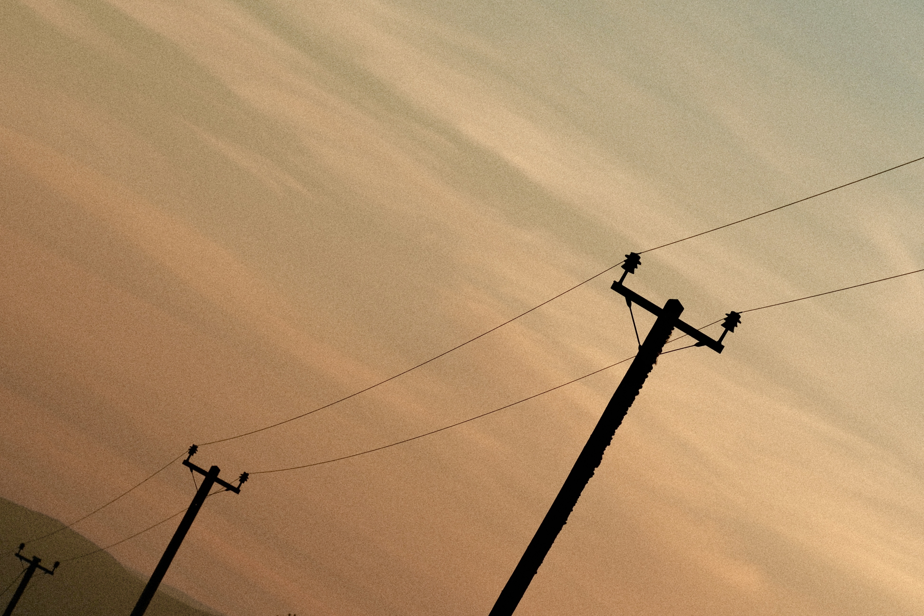 Wires in the sunset sky