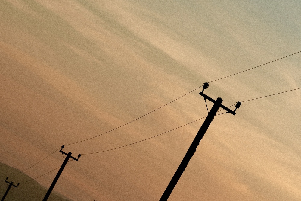 Wires in the sunset sky